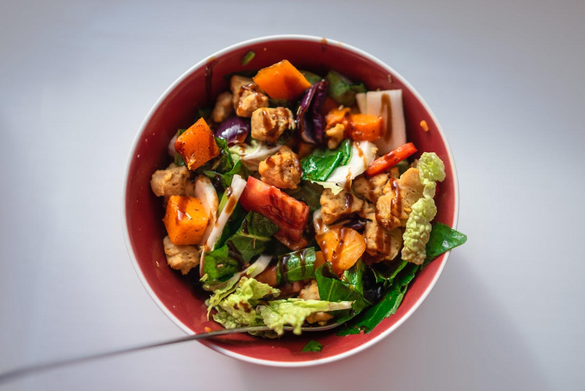 Nutritionist reviewing healthy meal plans and nutritional data